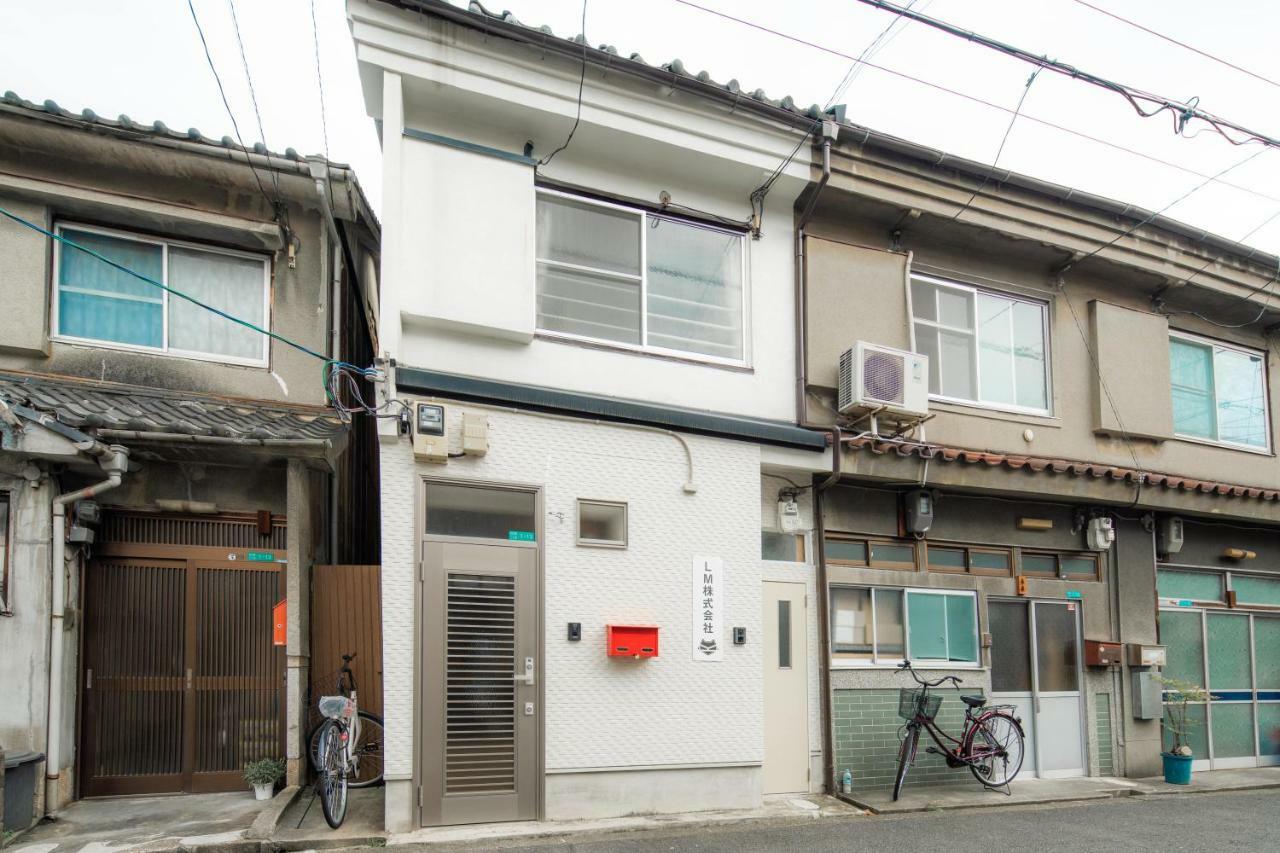 Appartamento Sakuragawa No Shima Osaka Esterno foto