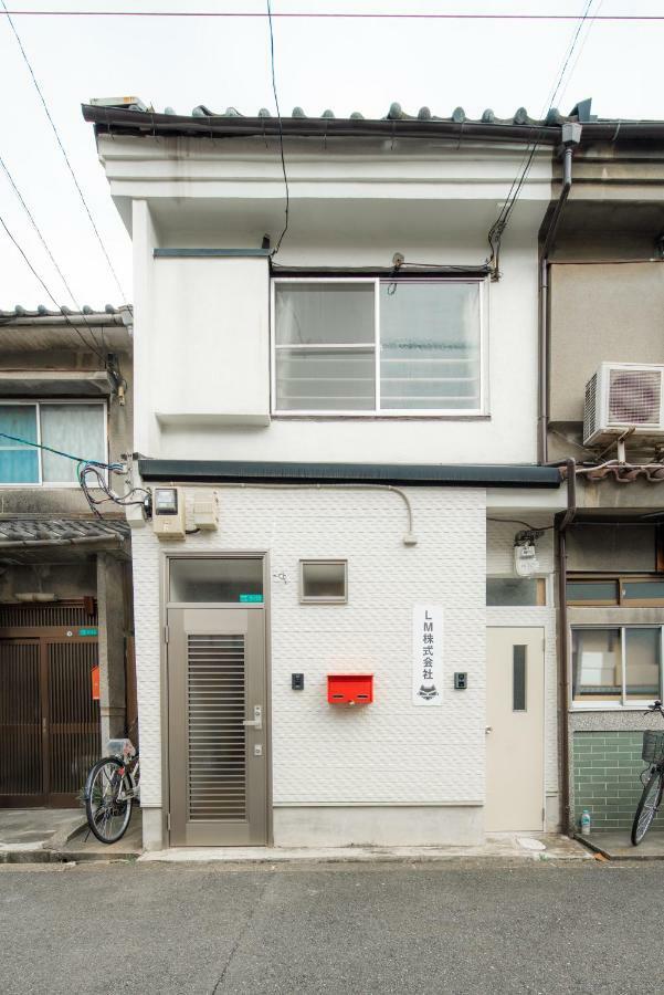 Appartamento Sakuragawa No Shima Osaka Esterno foto